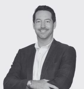 Black and White Headshot Aaron Kanters Arms crossed